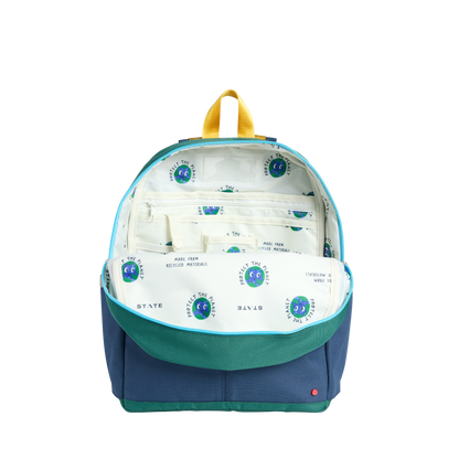Backpack with diaper contents on a white background
