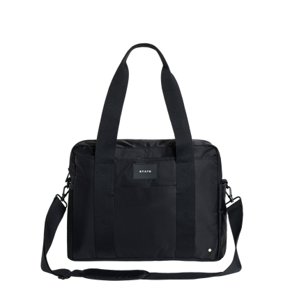 Black diaberbag with a visible brand label on a white background