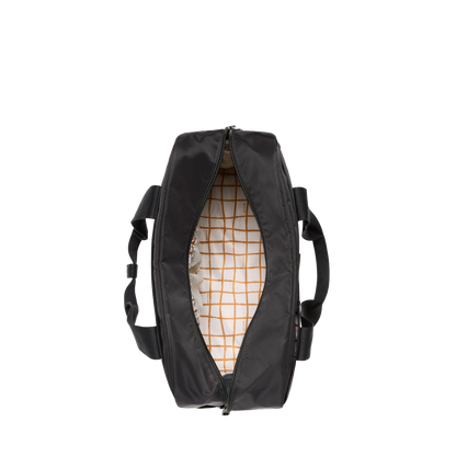 Black duffel bag with a grid pattern interior on a white background
