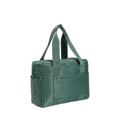 Green bag with multiple pockets and straps on a white background
