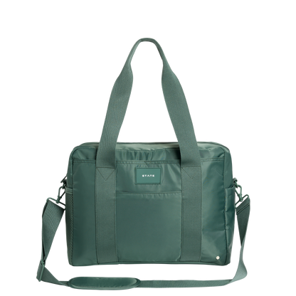 Green bag with a visible brand label on a white background