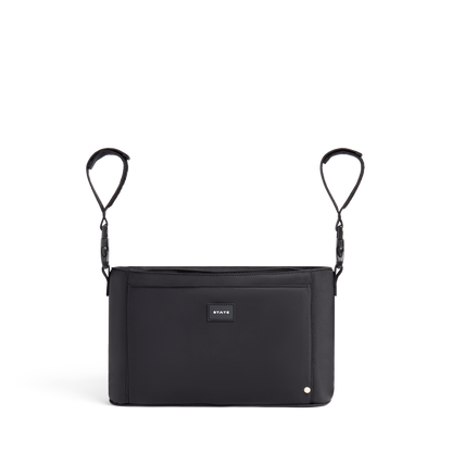 Black crossbody bag with a visible brand label on a white background