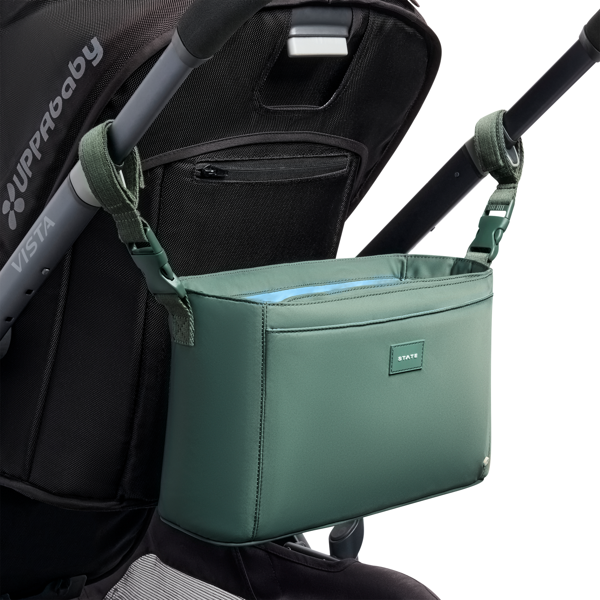 Green stroller organizer attached to a UPPAbaby Vista stroller on a white background