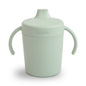Light green sippy cup with handles on a white background