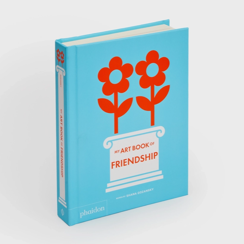 Book titled 'My Art Book of Friendship' with red flowers on a blue background