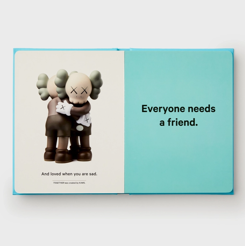 Animated character hugging itself with text 'Everyone needs a friend' on a blue background