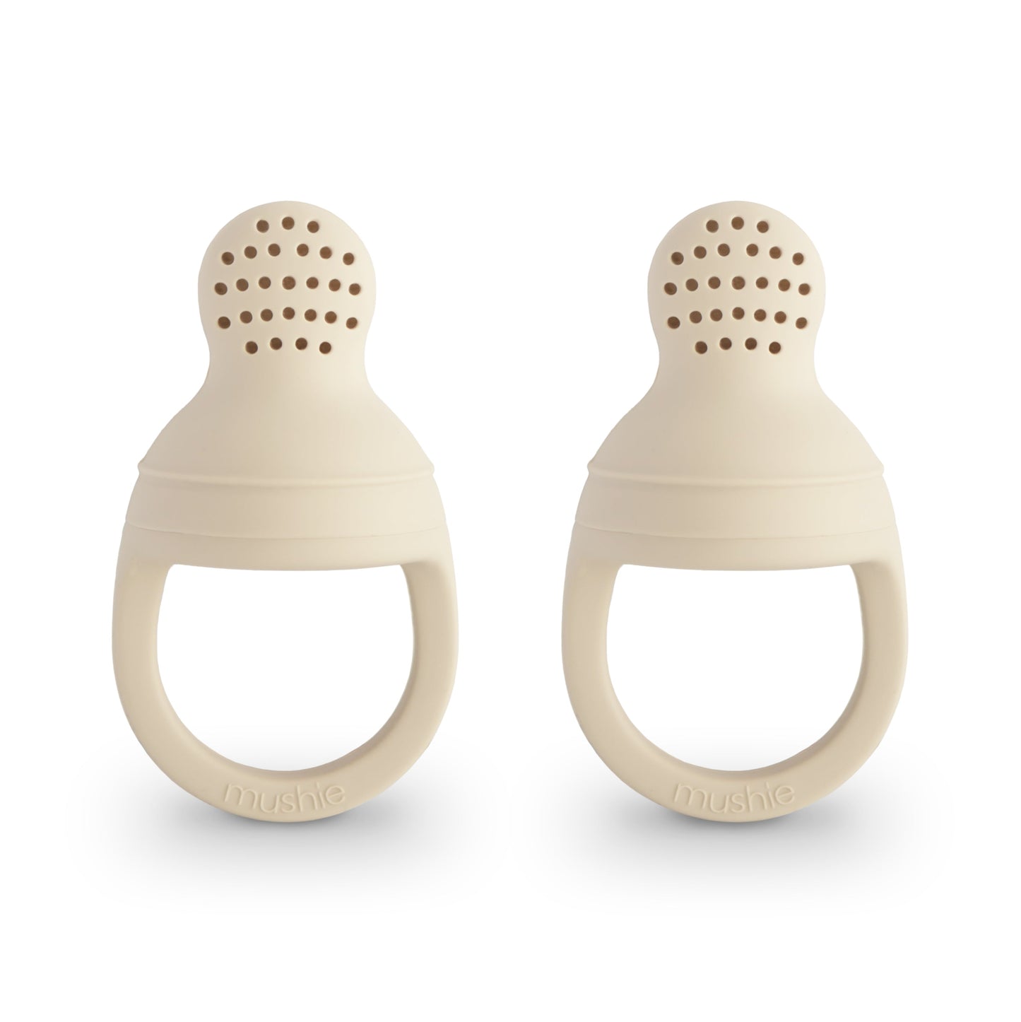 Two beige silicone teething rings on a white background
