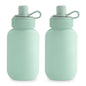 Two light green water bottles with screw-on caps on a white background