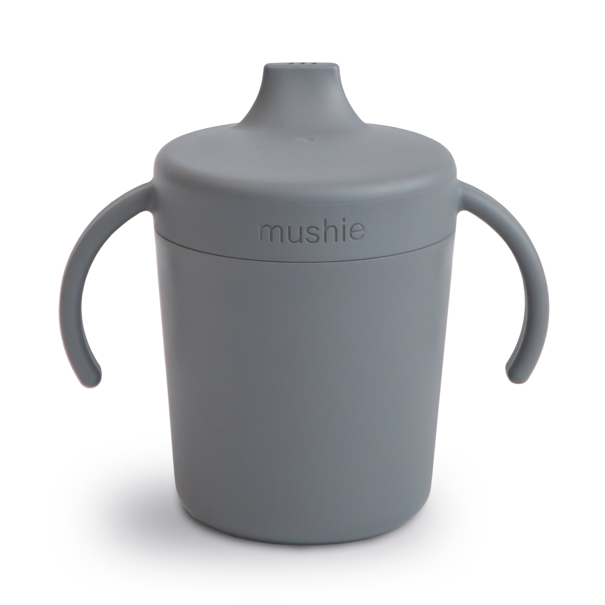 Gray sippy cup with handles and 'mushie' branding on a white background