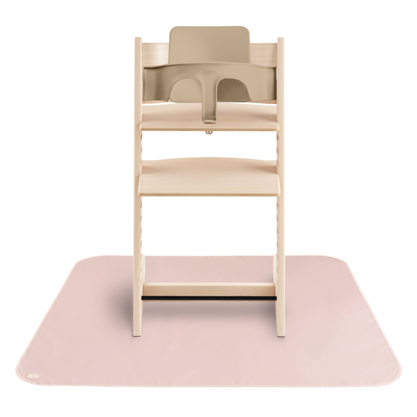 Wooden high chair with beige seat on a pink mat against a white background