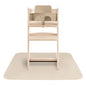 Wooden high chair with beige cushion on a white background