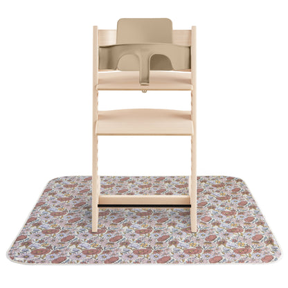 Wooden high chair with a floral-patterned mat on a white background
