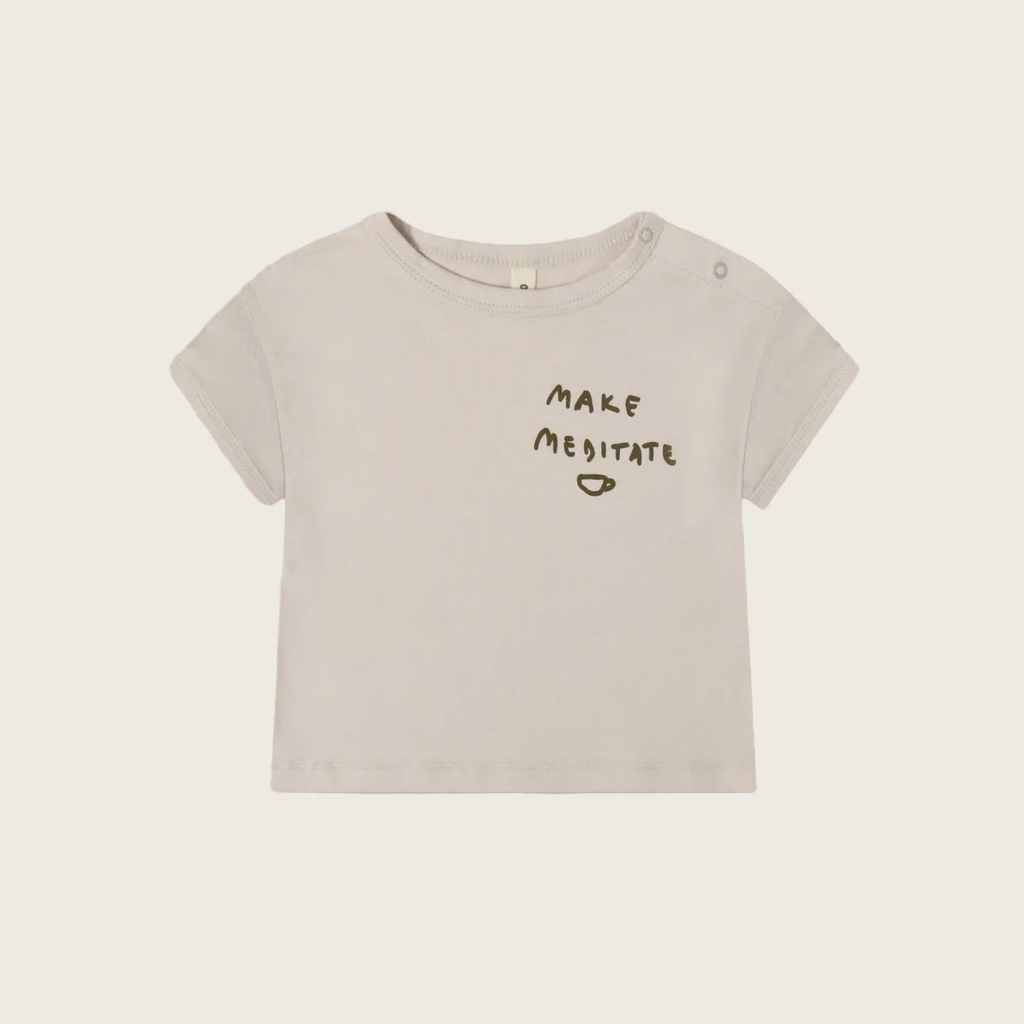 Beige t-shirt with 'MAKE MEDITATE' text on a light beige background
