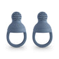 Two blue silicone baby teething rings on a white background