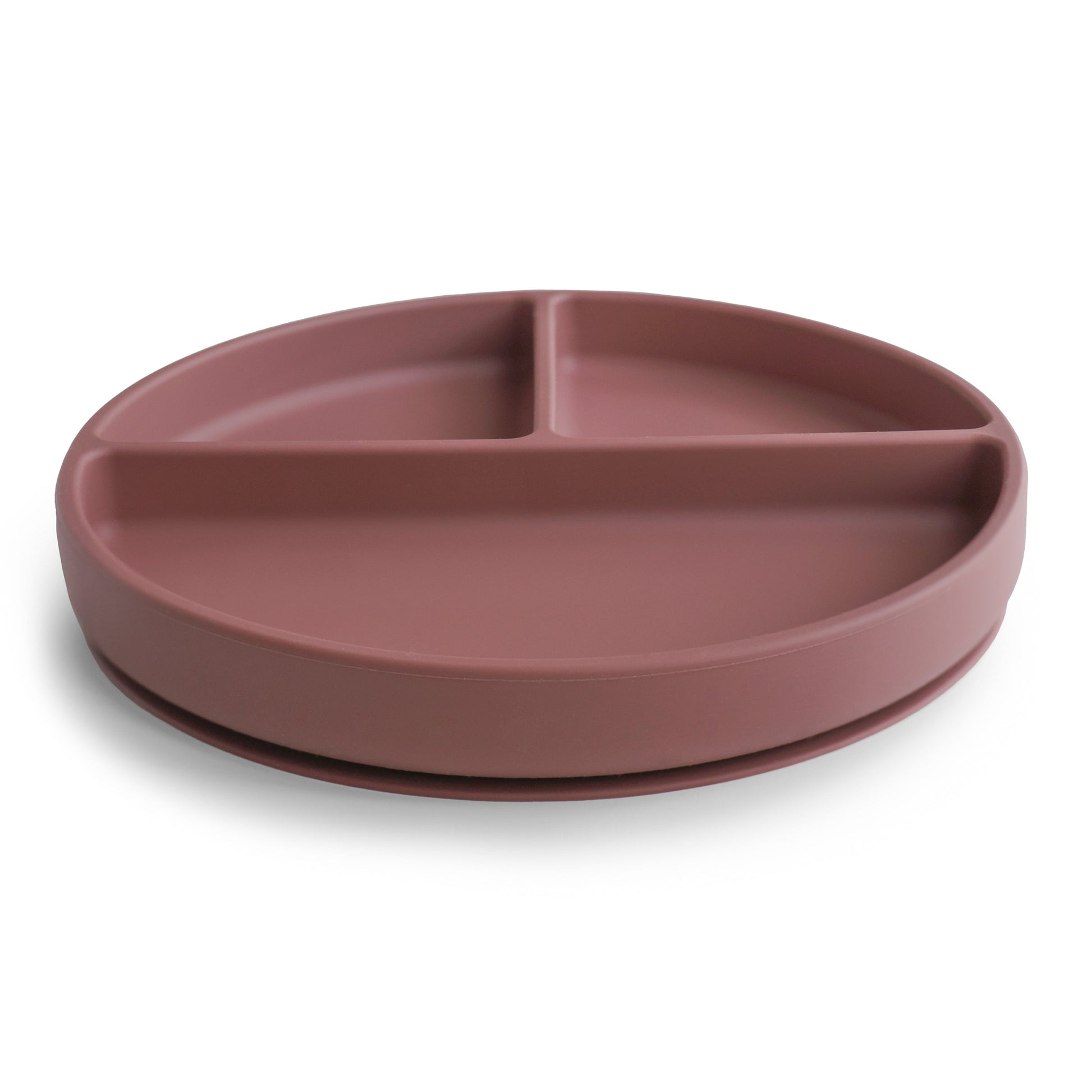 Pink divided plate on a white background