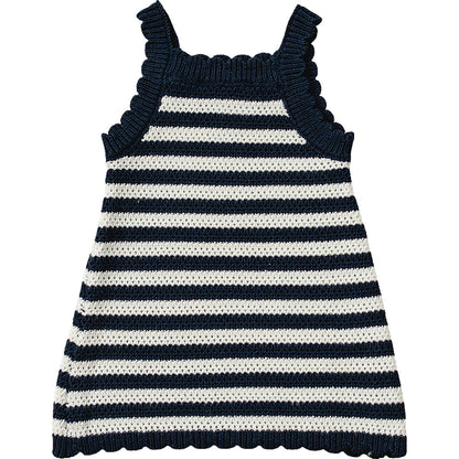 Navy and white striped dress with ruffled neckline on a white background