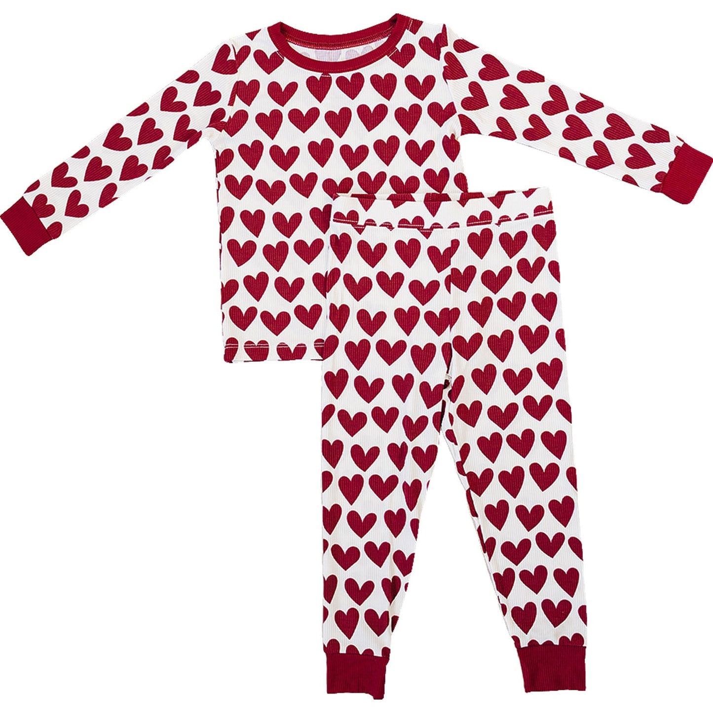 Children's pajama set with red heart pattern on a white background