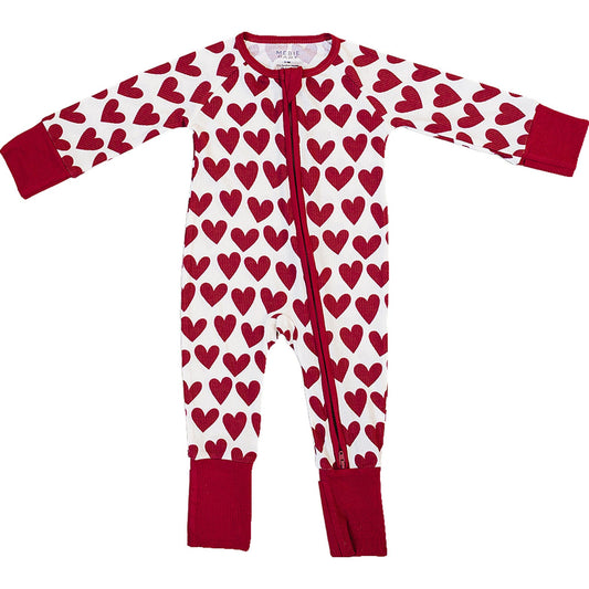 Children's onesie with red heart pattern on a white background