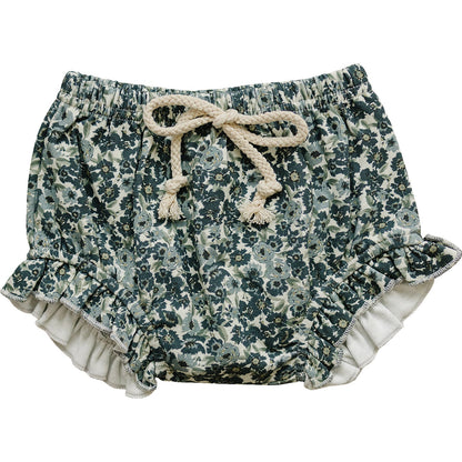 Floral patterned shorts with ruffles on a white background
