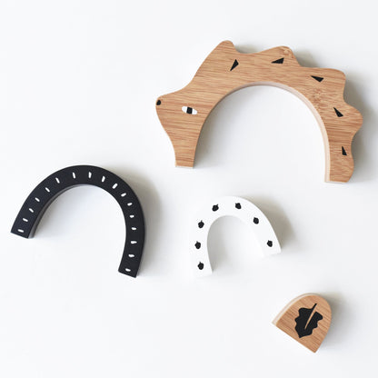 Set of wooden toys with different shapes on a white background