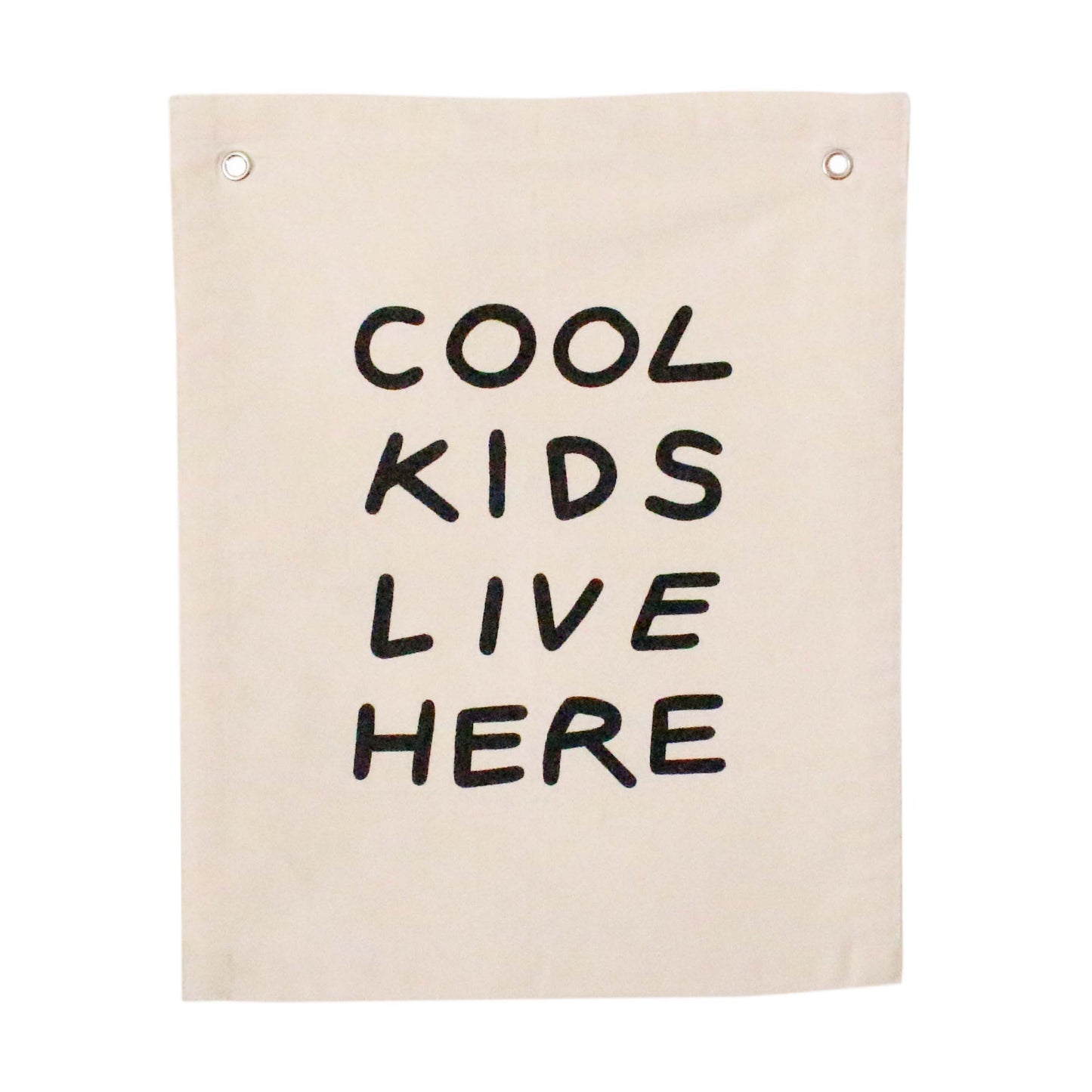 Beige canvas wall hanging with 'Cool Kids Live Here' text on a white background