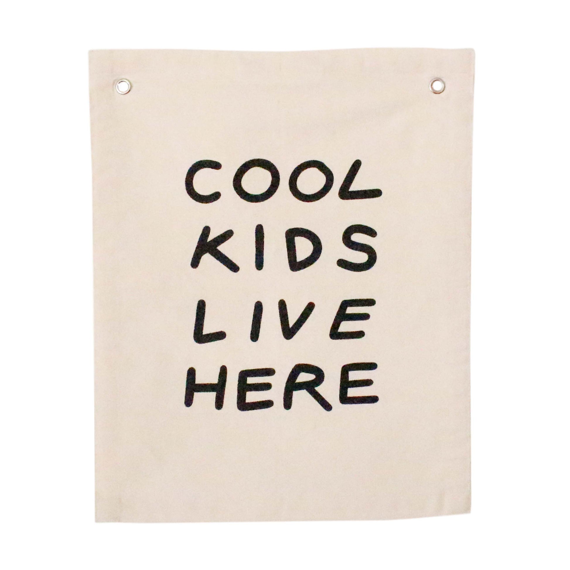 Beige canvas wall hanging with 'Cool Kids Live Here' text on a white background