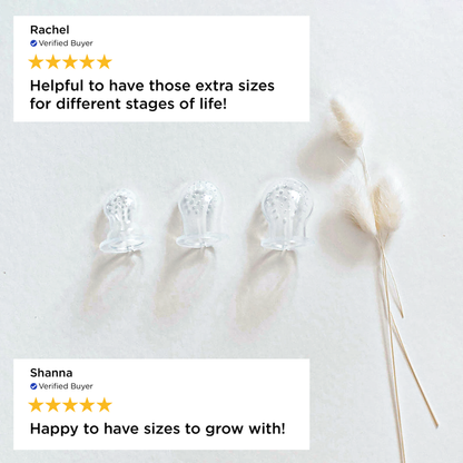 Clear glass cups on a white surface with customer reviews displayed.