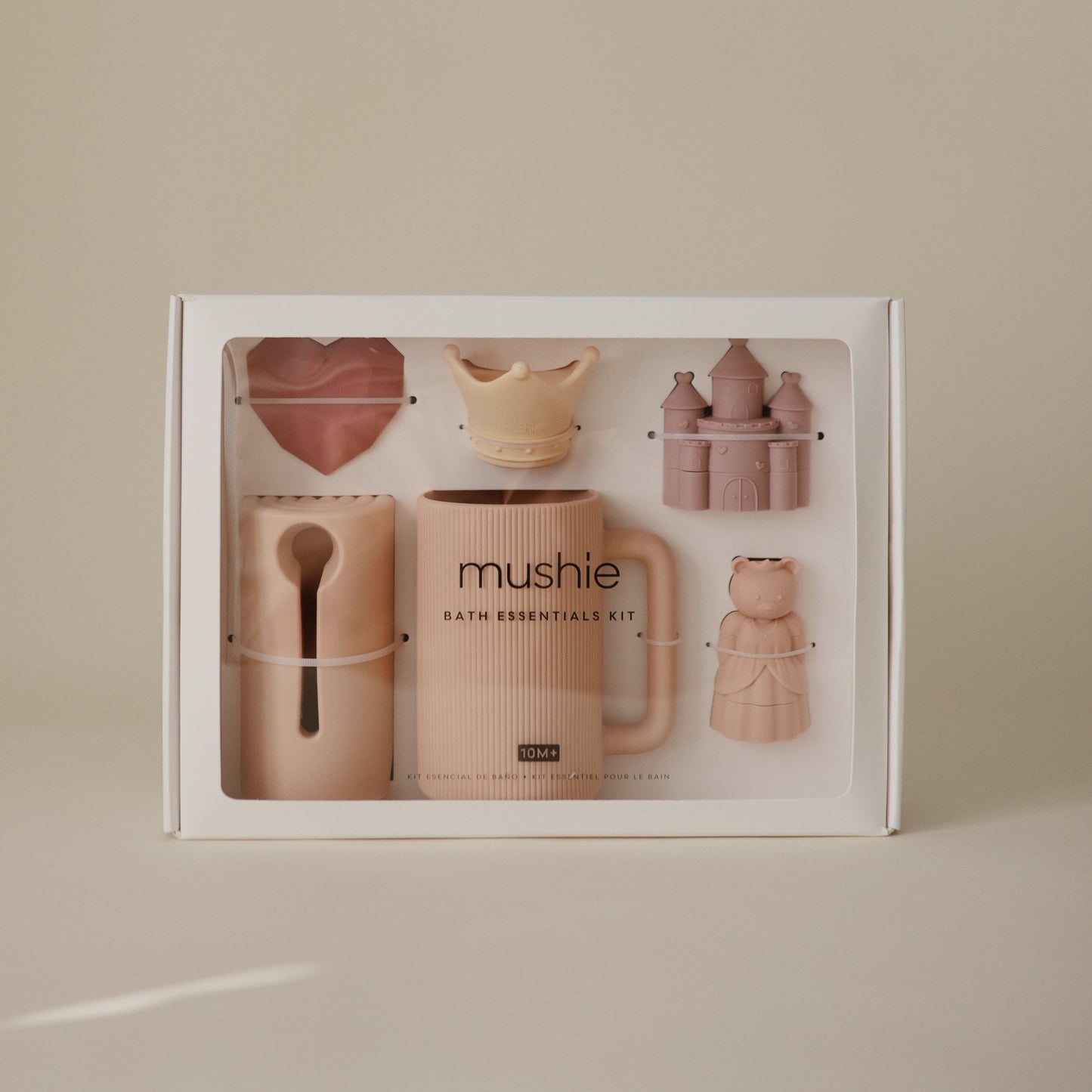 Mushie bath essentials kit packaging on a beige background