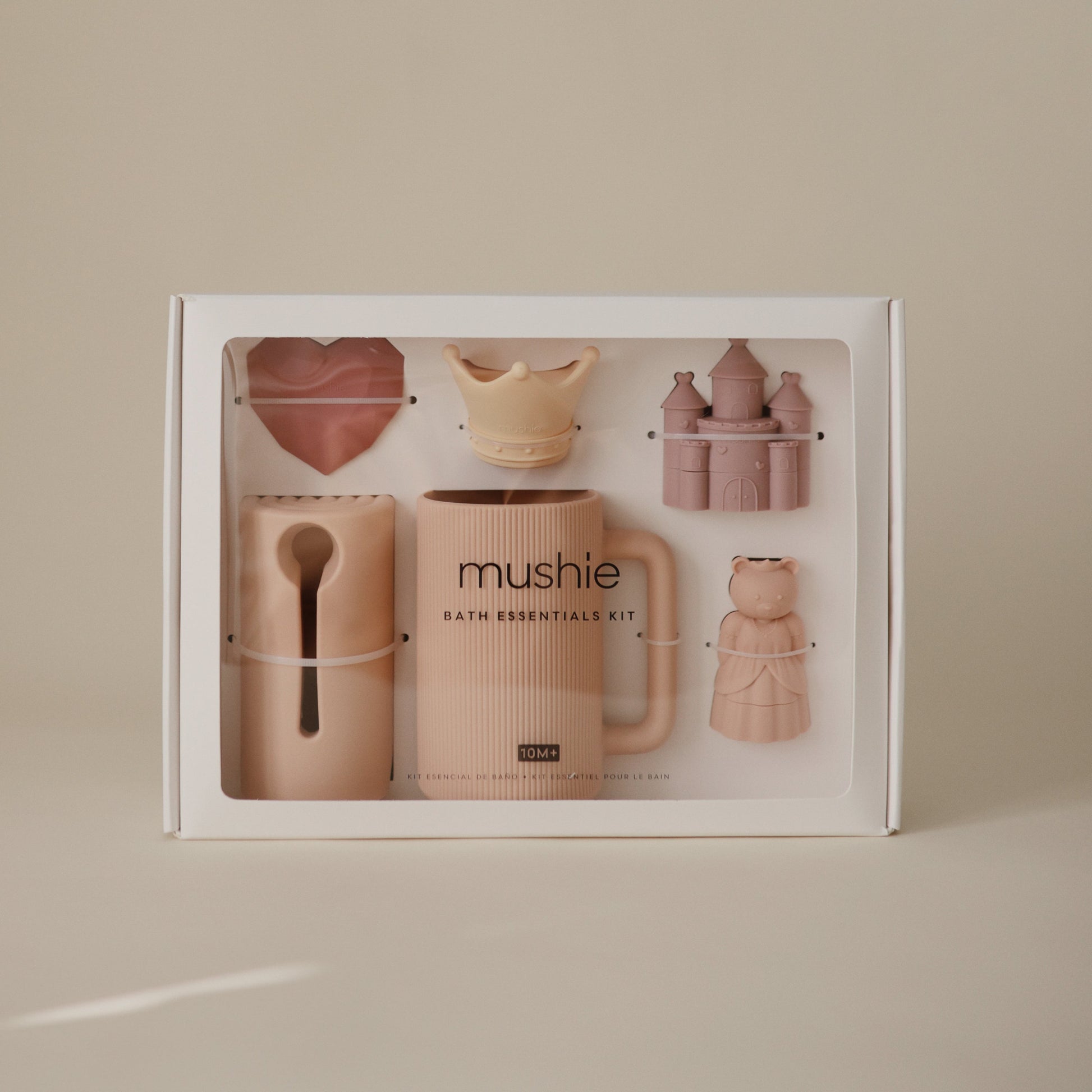 Mushie bath essentials kit packaging on a beige background