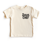 Beige t-shirt with 'Sous Chef' text on a white background
