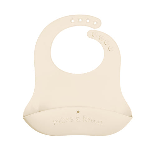 Beige silicone bib with 'moss & twine' branding on a white background