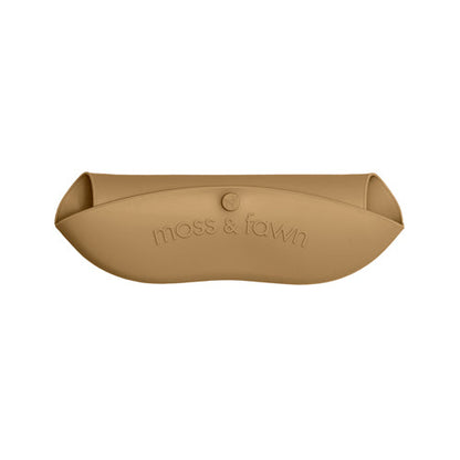 Tan pet bed with 'moss & fawn' branding on a white background