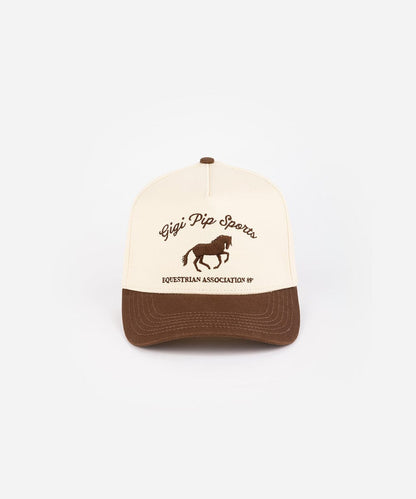 Trucker hat with 'Gigi Pip Sports' and horse logo on a white background