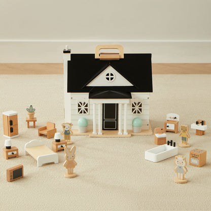 Wooden toy house with various furniture and accessories on a neutral background