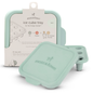 Mint green ice cube tray with packaging on a white background