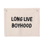 Canvas banner with 'LONG LIVE BOYHOOD' text on a white background