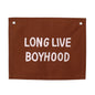 Brown banner with 'LONG LIVE BOYHOOD' text on a white background