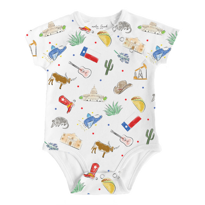 Baby onesie with colorful Texas-themed illustrations on a white background