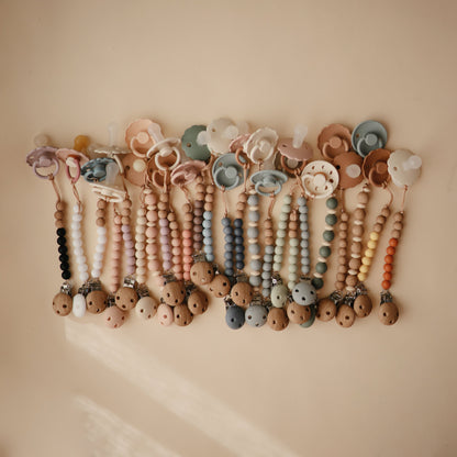 Mushie Silicone Pacifier Clip – Mila