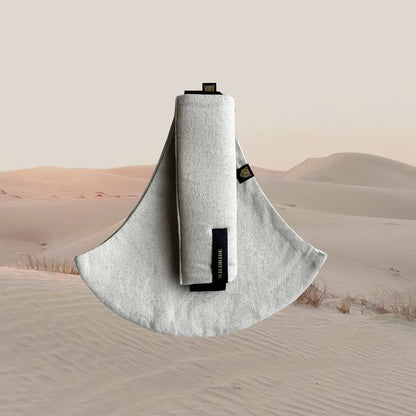 Toddler carrier with brand logo on a desert background