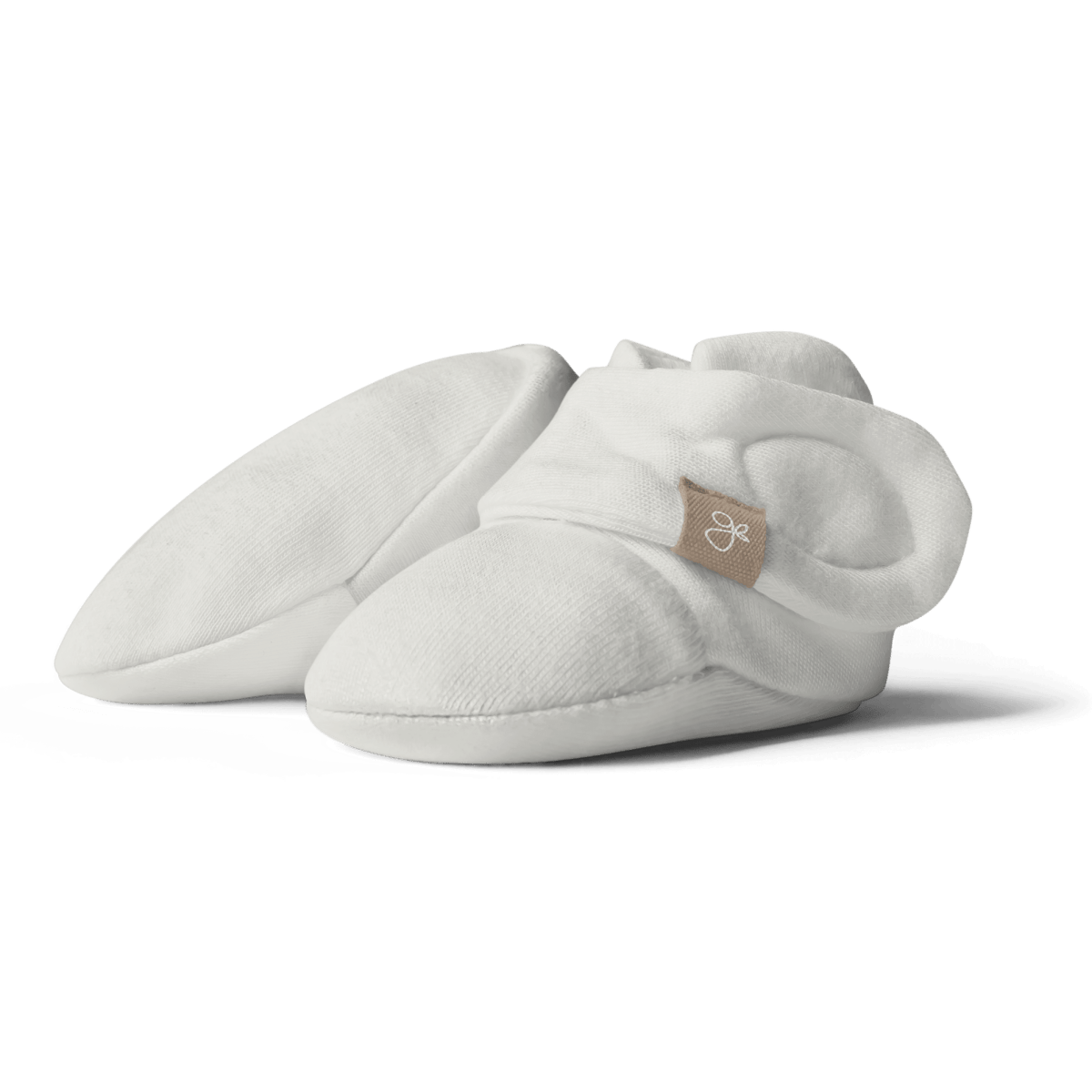 White baby booties with a brand logo on a transparent background