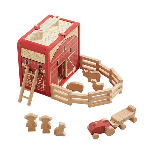Wooden toy barn set with animals and figures on a white background