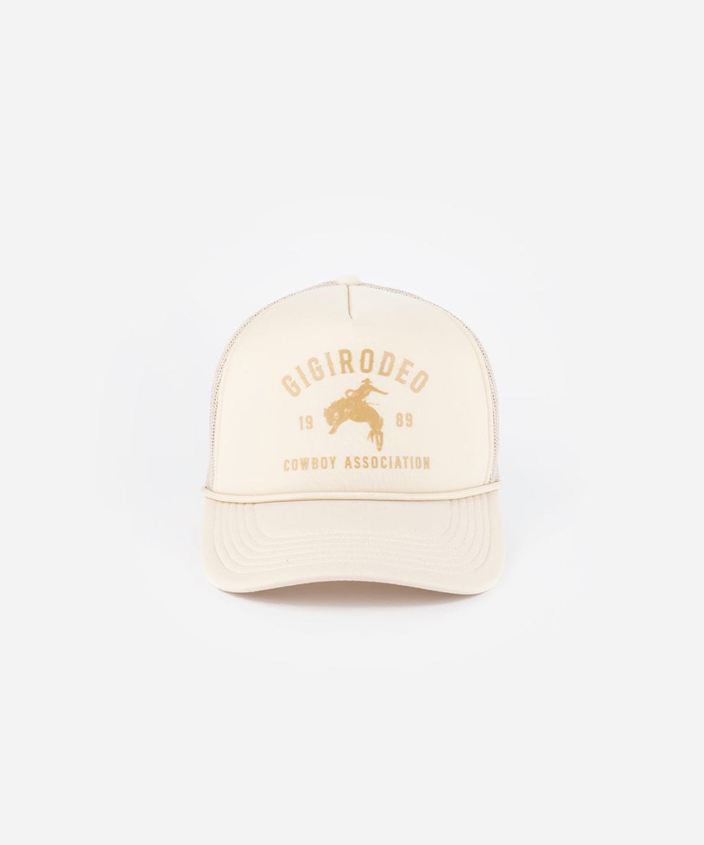 Beige cap with gold text and logo on a white background