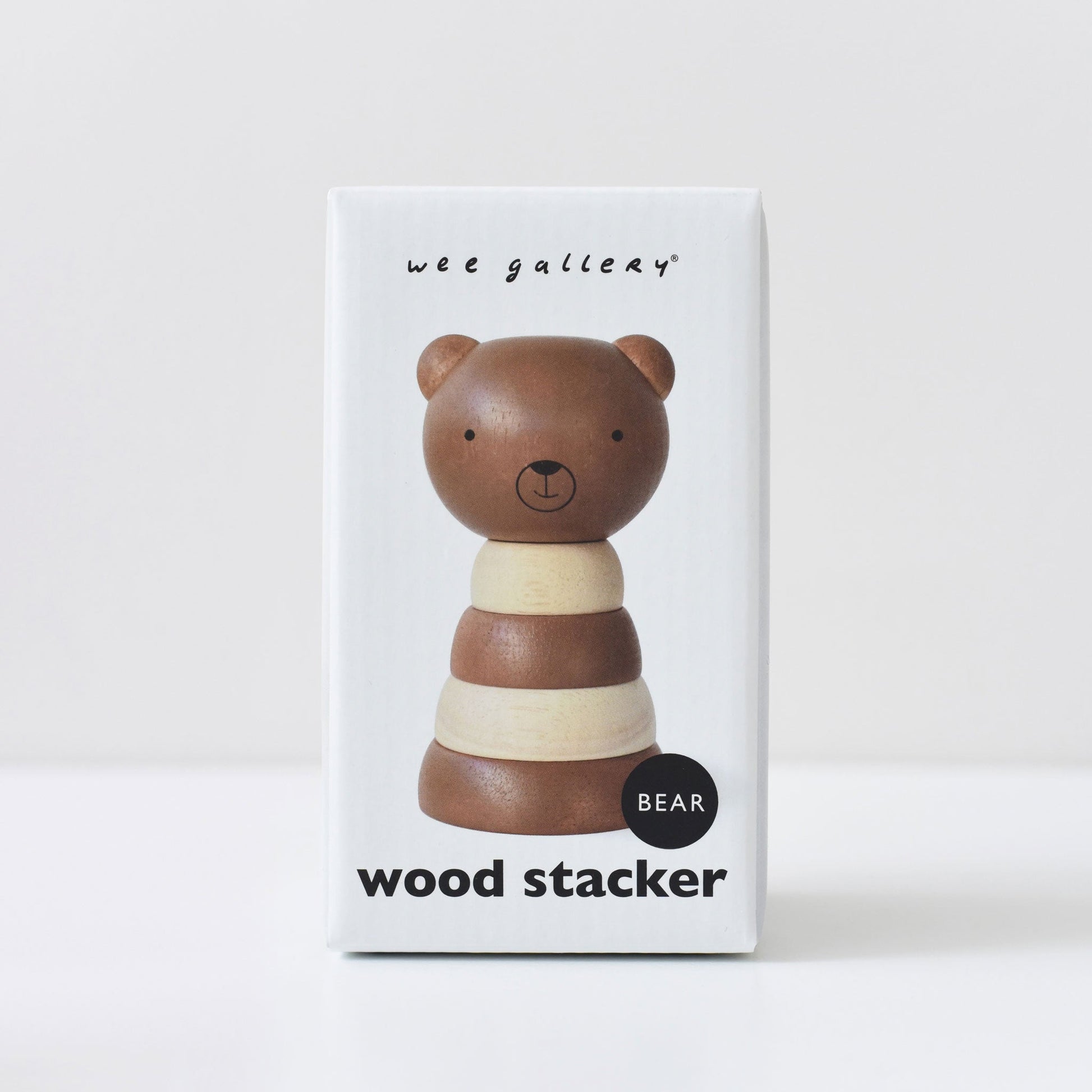 Wee Gallery wood stacker toy packaging with a bear design on a white background