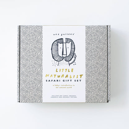 Gift set packaging for 'Little Naturalist Safari' with a lion illustration on a white background