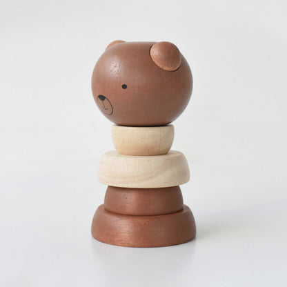 Wooden toy stacker with bear design on a white background