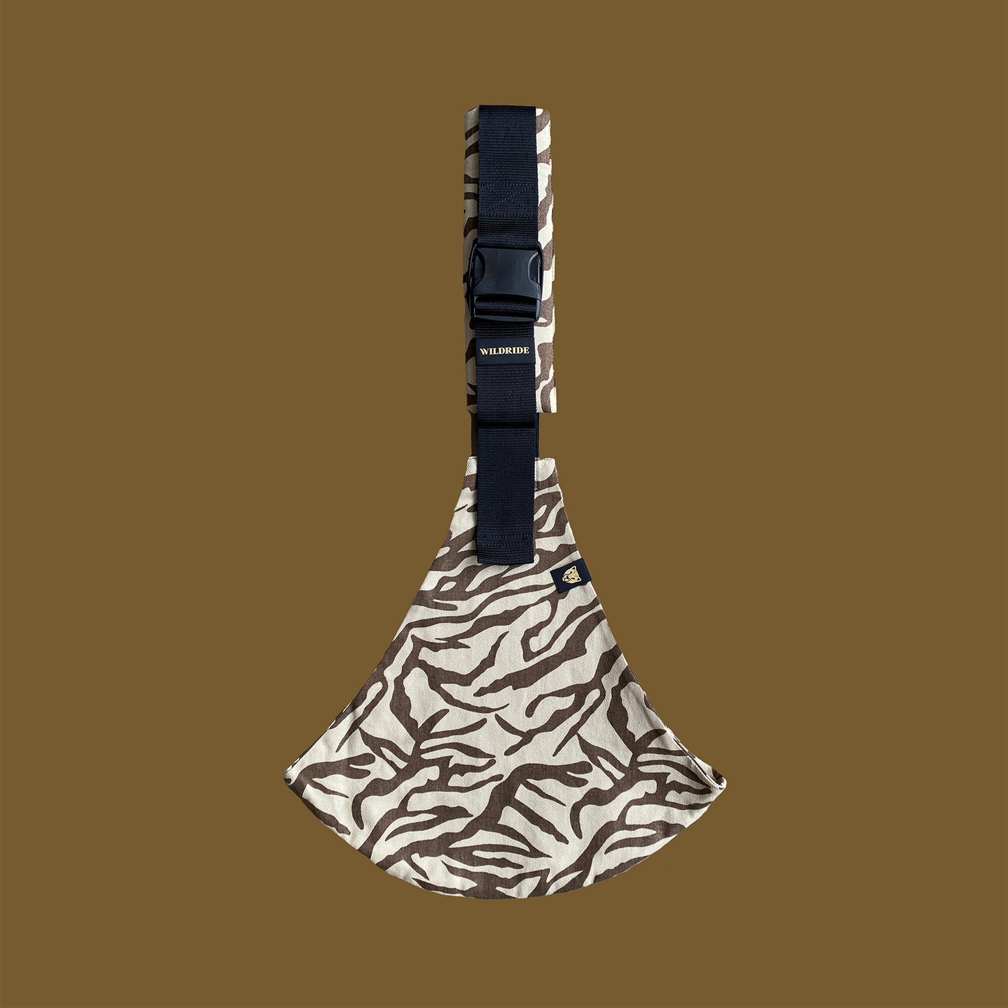 Patterned pouch with a strap on a brown background