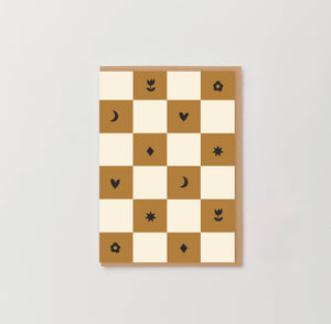 Ochre checkerboard notecard with hearts, flowers, moons